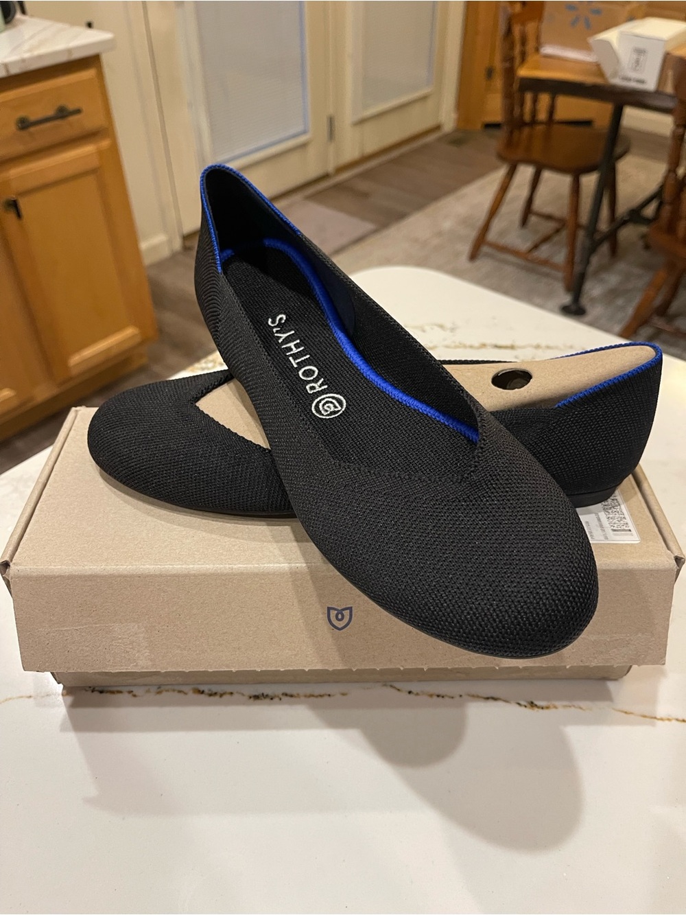 Rothy's Black Knit Flats with Blue Trim